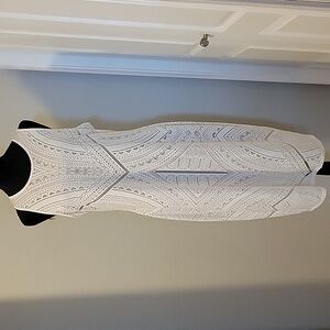 Elegant White Sleeveless Midi Dress - Intricate Lace Detail